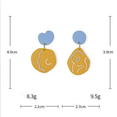 Mismatched Face Earrings