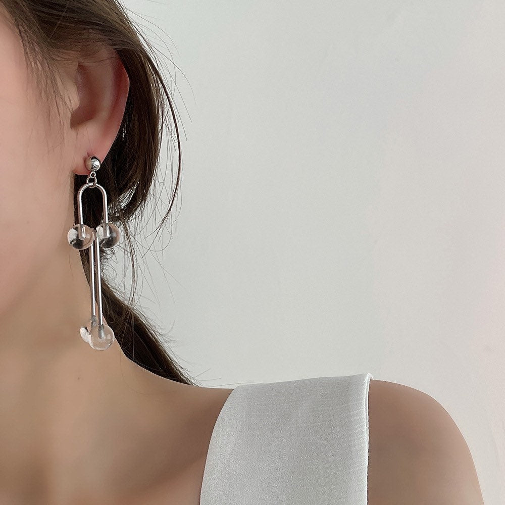 Asymmetric U shape ball link hoops