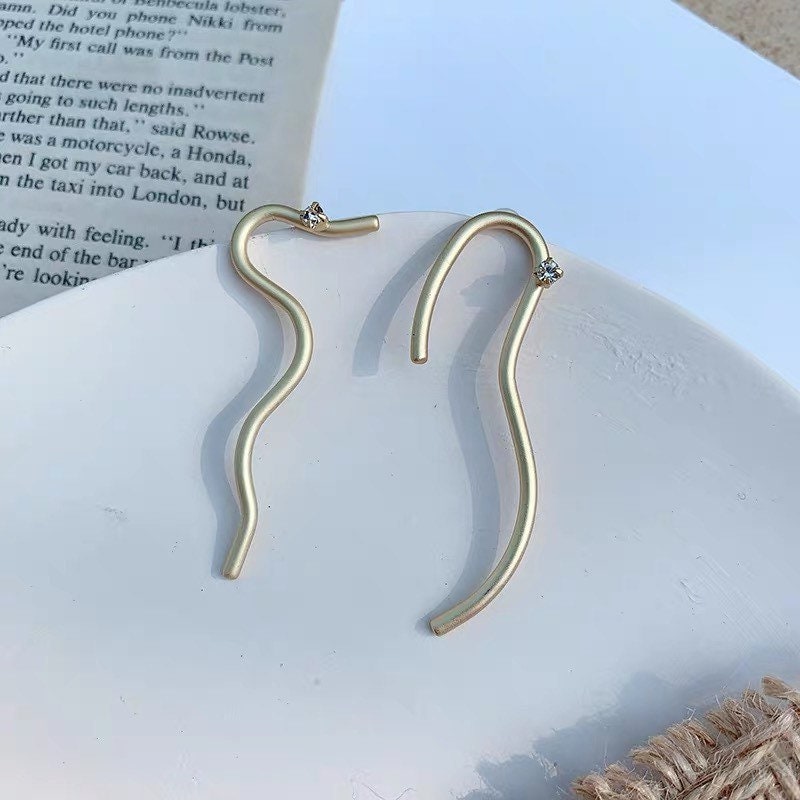 Curvilinear Spark Gold Studs