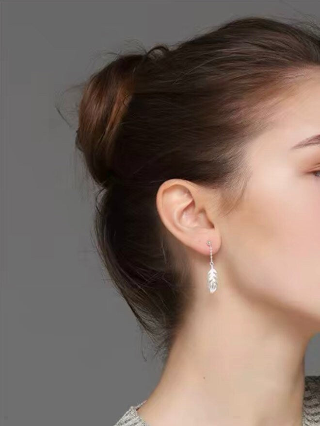 Tiny feathers earrings, Dangle earrings, Sterling Silver, Mismatched earrings, Cutest.