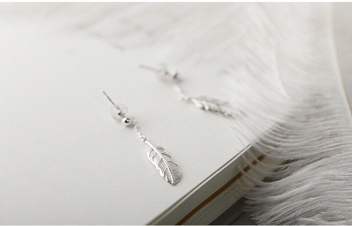 Tiny feathers earrings, Dangle earrings, Sterling Silver, Mismatched earrings, Cutest.